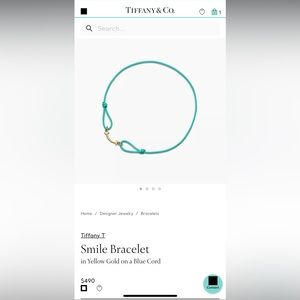 Tiffany & Co Smile Bracelet in Yellow Gold on a Blue Cord